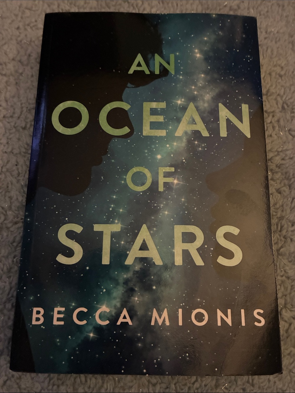 An Ocean of Stars by Becca Mionis - Starry Blue Cover